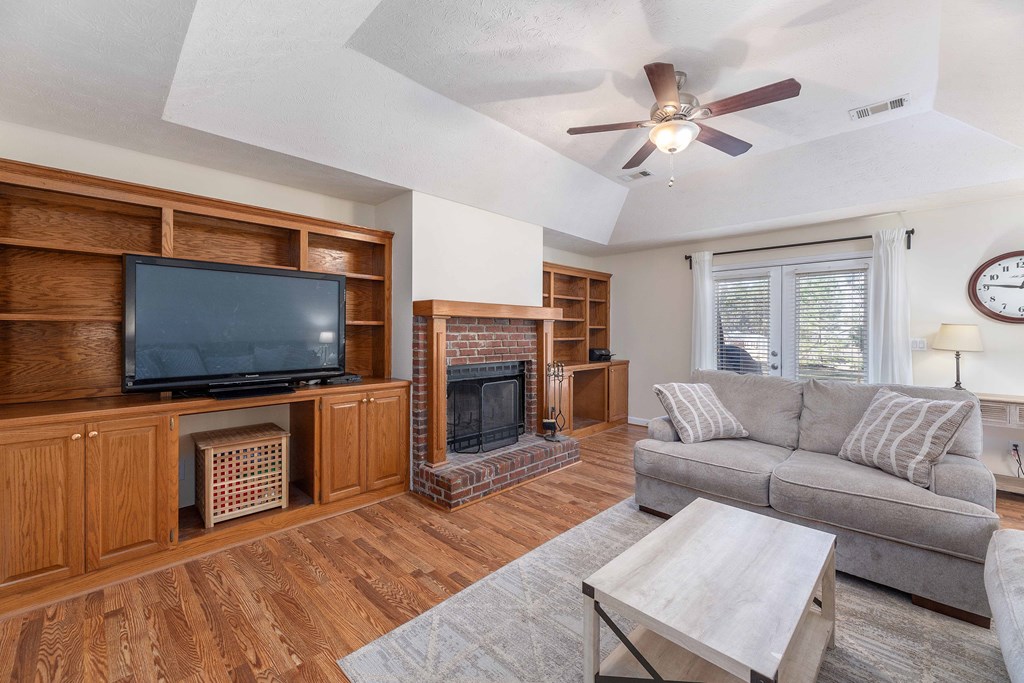 54 Waterford Drive Cataula, GA 31804 - Photo 3 of 25 a living room with furniture and a flat screen tv