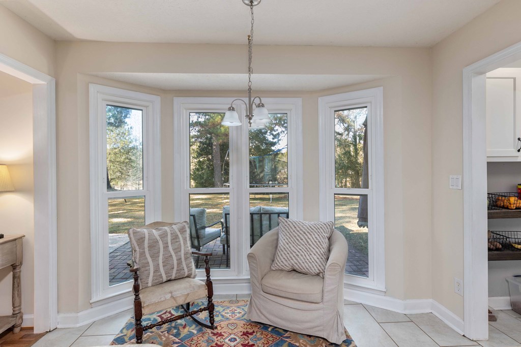 54 Waterford Drive Cataula, GA 31804 - Photo 7 of 25 a living room with furniture and a window