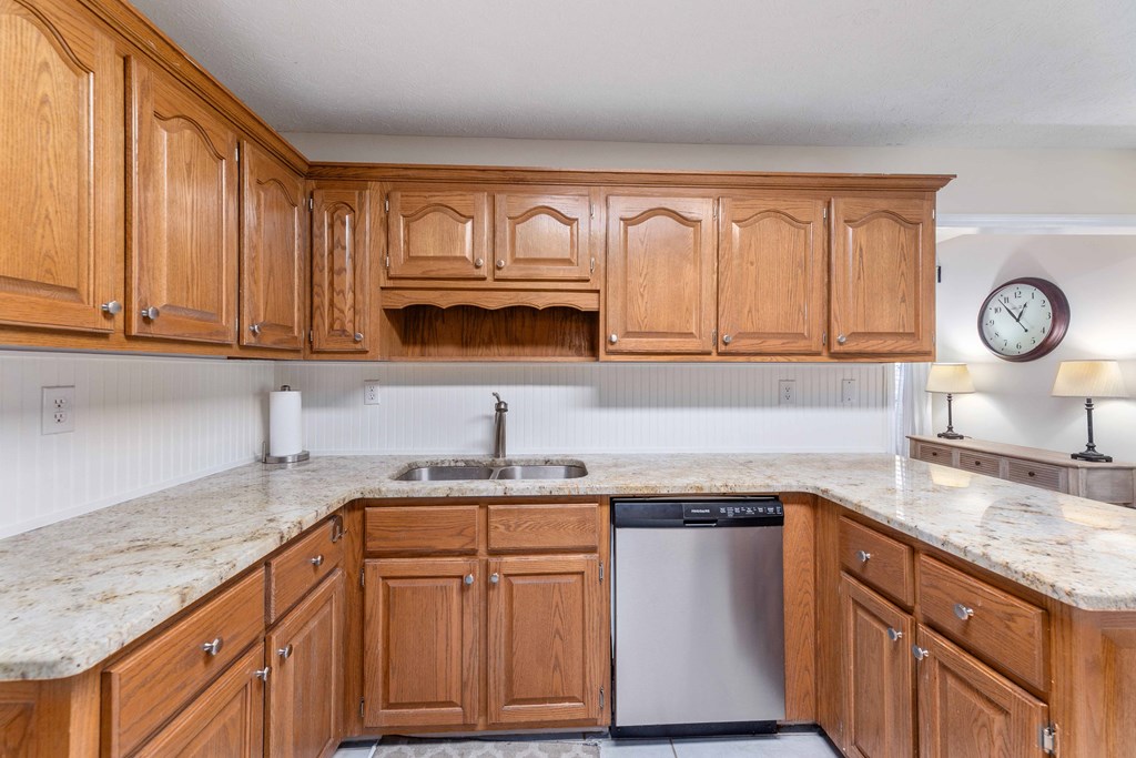 54 Waterford Drive Cataula, GA 31804 - Photo 10 of 25 a kitchen with stainless steel appliances granite countertop a sink a stove cabinets and wooden floor
