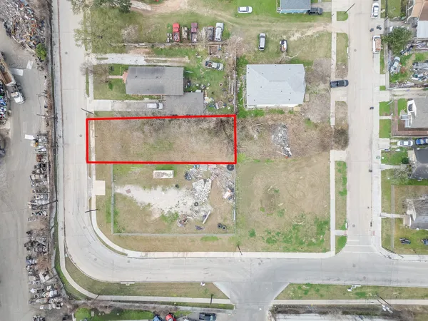 a view of a swimming pool with a yard