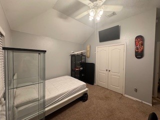 3110 Katner Lane Spring, TX 77386 - Photo 20 of 24 a bedroom with a bed and a flat screen tv