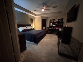 3110 Katner Lane Spring, TX 77386 - Photo 5 of 24 a bedroom with a bed and a television in it