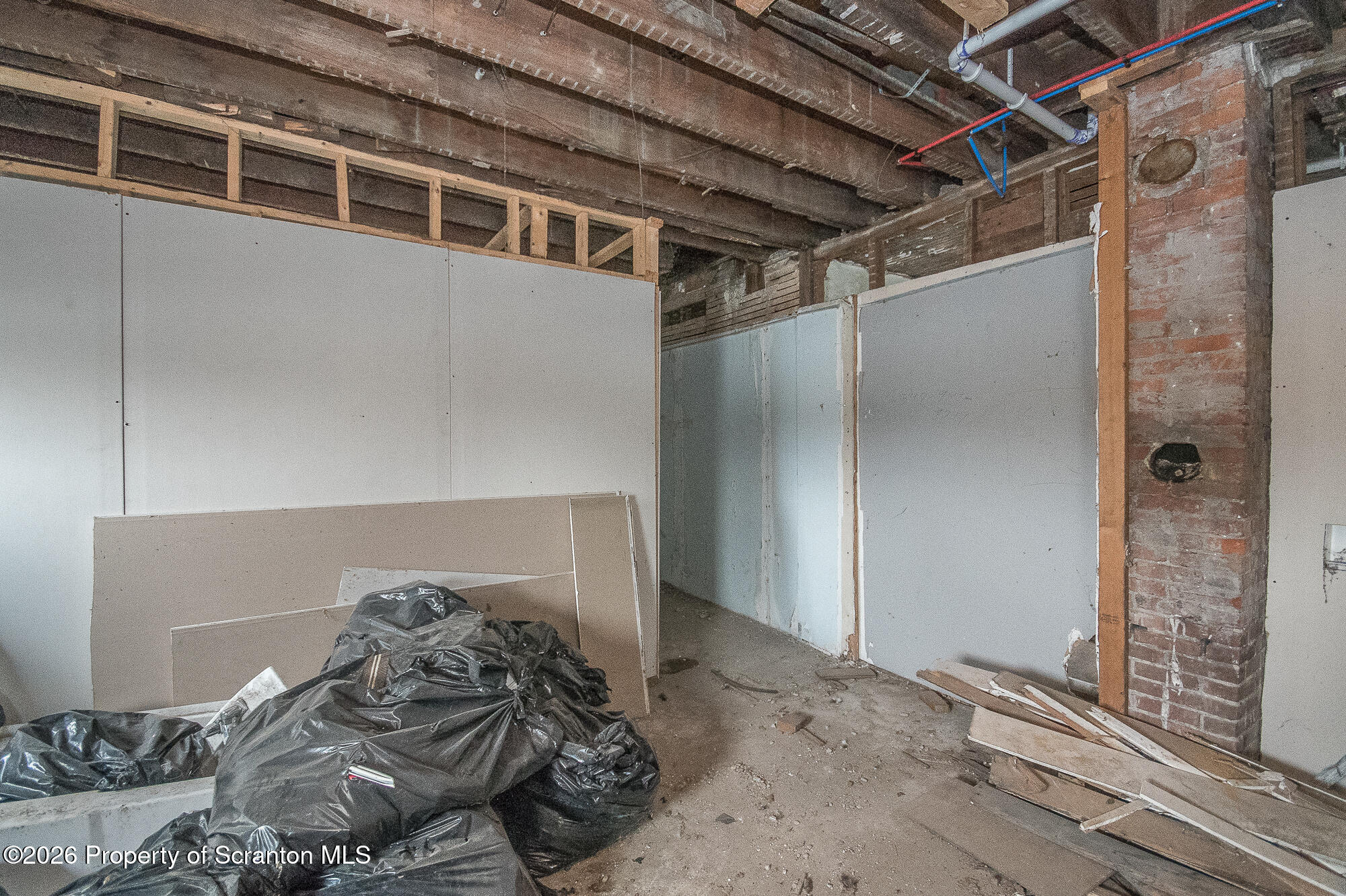 922 West Elm Street Scranton, PA 18504 - Photo 17 of 29 a view of a livingroom with a bed