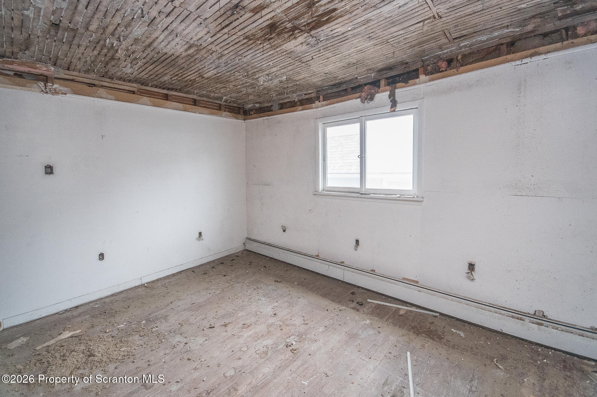 922 West Elm Street Scranton, PA 18504 - Photo 22 of 29 a view of a room with window and ceiling fan
