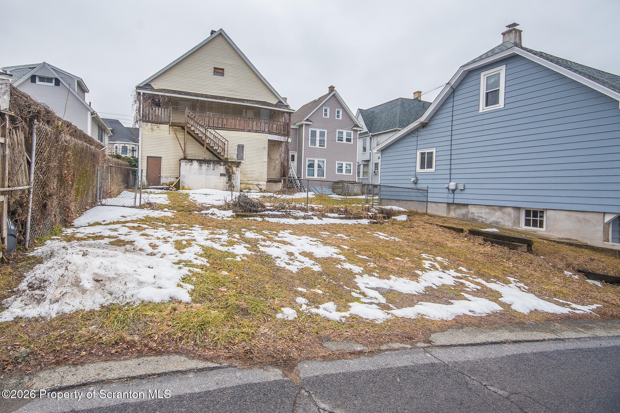 922 West Elm Street Scranton, PA 18504 - Photo 29 of 29 a view of a house with a yard