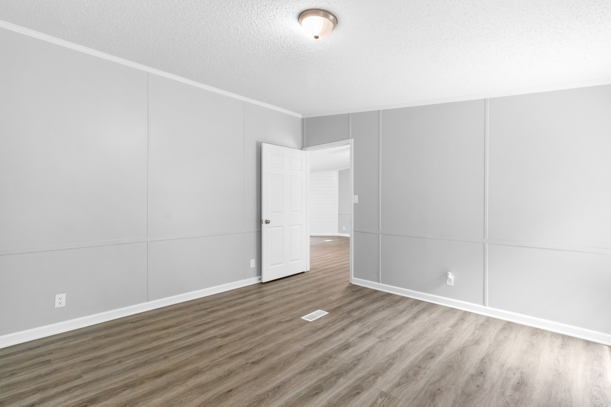 2177 Highway 76 Adams, TN 37010 - Photo 19 of 23 a view of an empty room with wooden floor