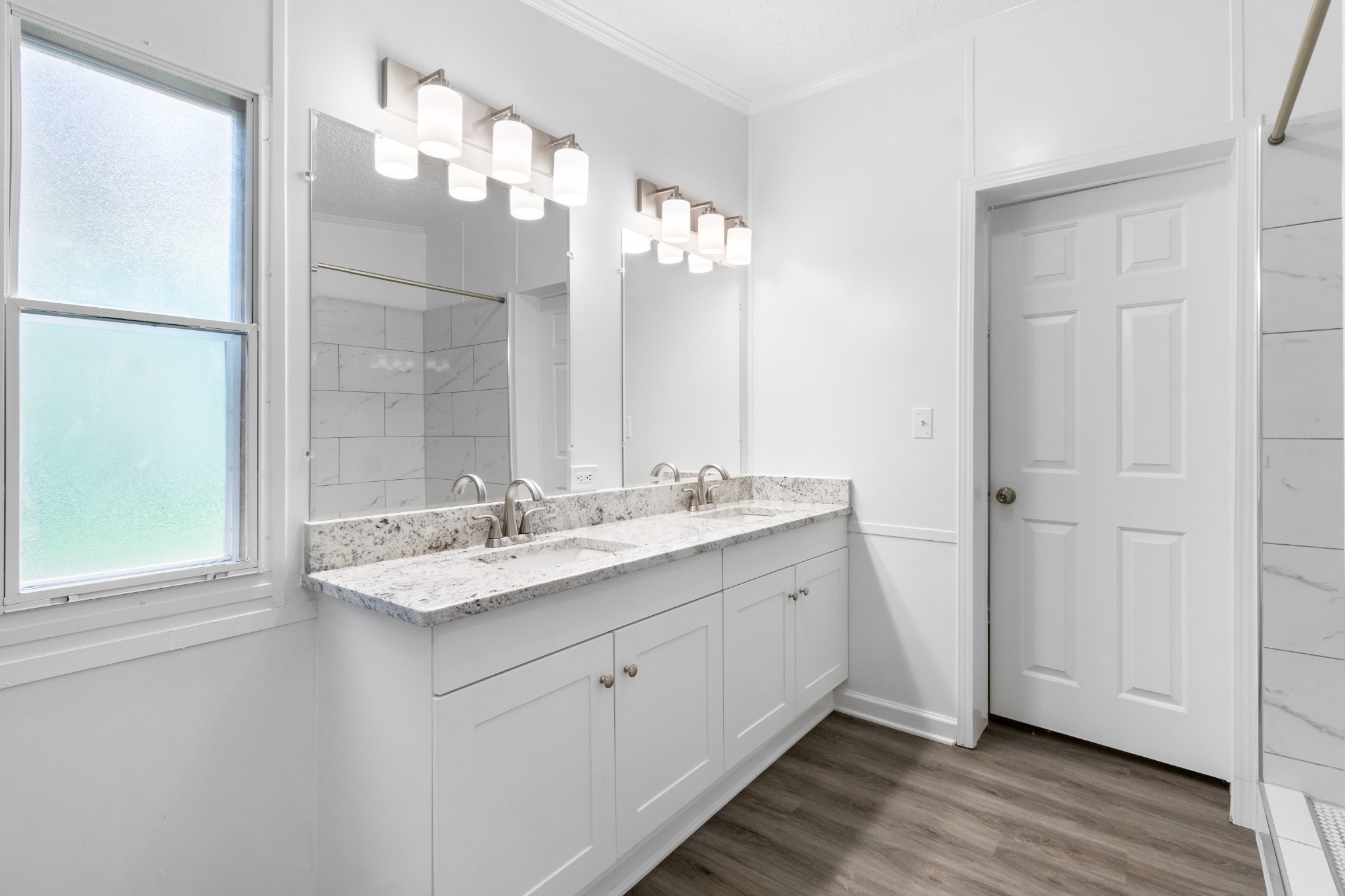 2177 Highway 76 Adams, TN 37010 - Photo 20 of 23 a bathroom with a double vanity sink and a mirror