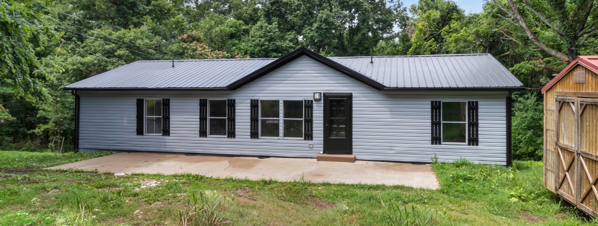 2177 Highway 76 Adams, TN 37010 - Photo 4 of 23 a house with a garden view