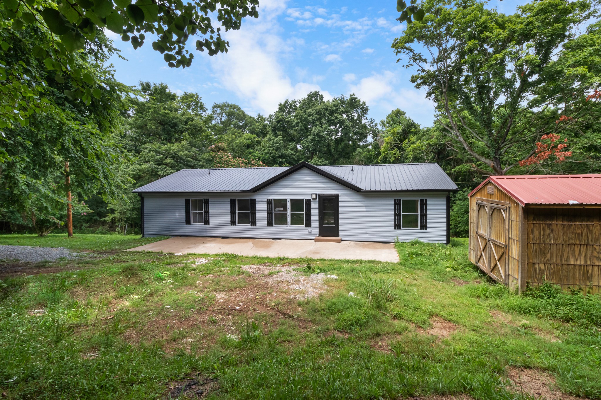 2177 Highway 76 Adams, TN 37010 - Photo 5 of 23 a front view of a house with yard