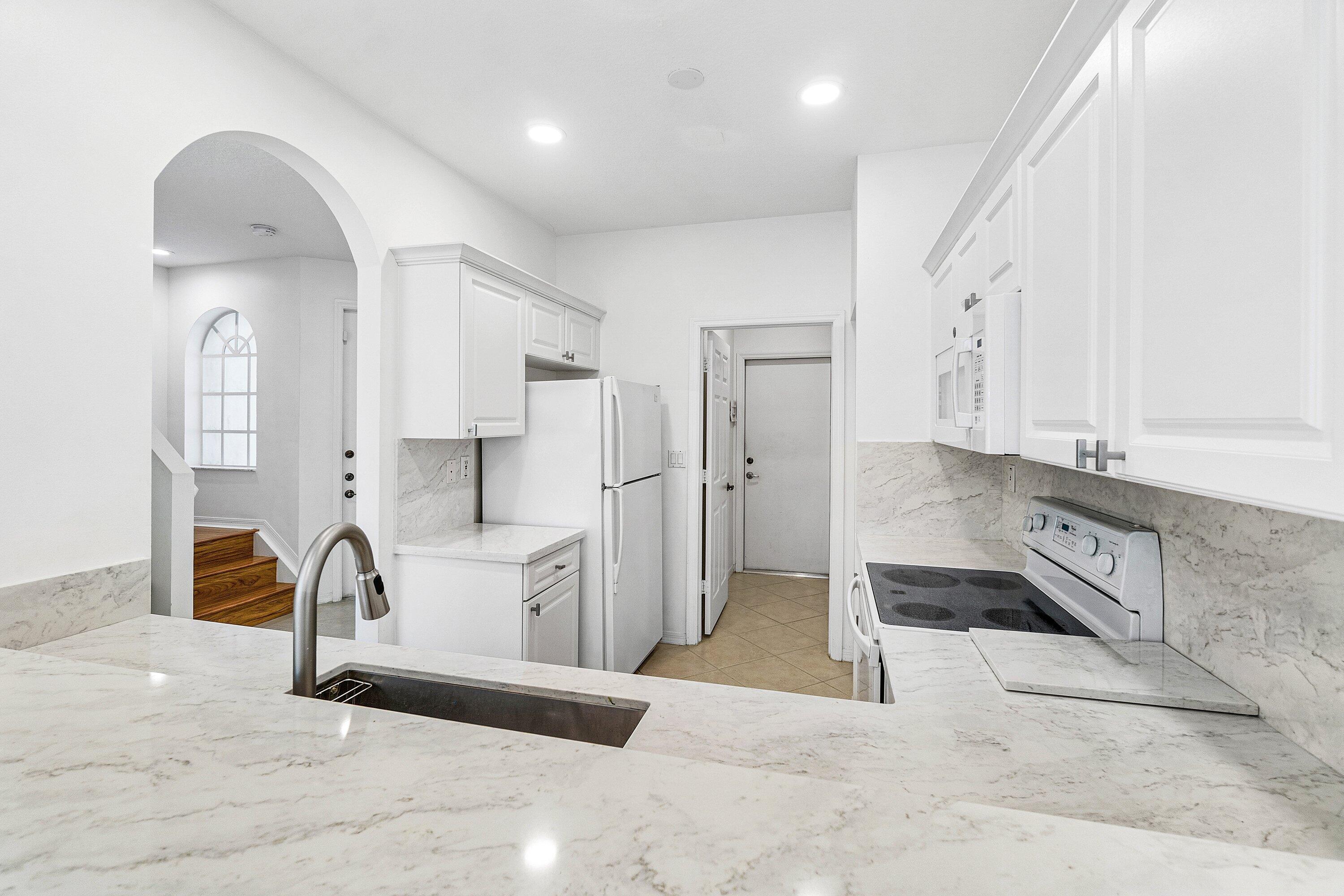 139 Coconut Key Lane Delray Beach, FL 33484 - Photo 9 of 32 kitchen2