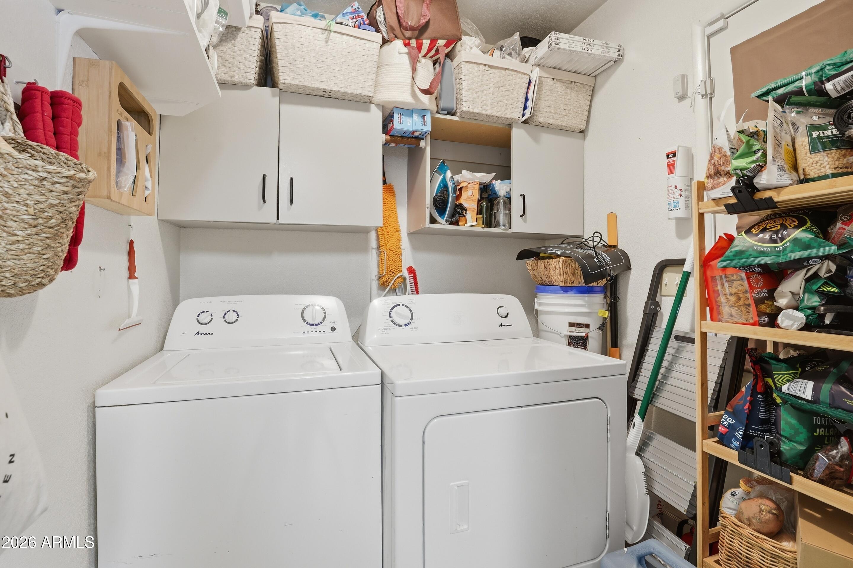 201 North McLane Road Payson, AZ 85541 - Photo 16 of 42 a view of storage and utility room with washer and dryer