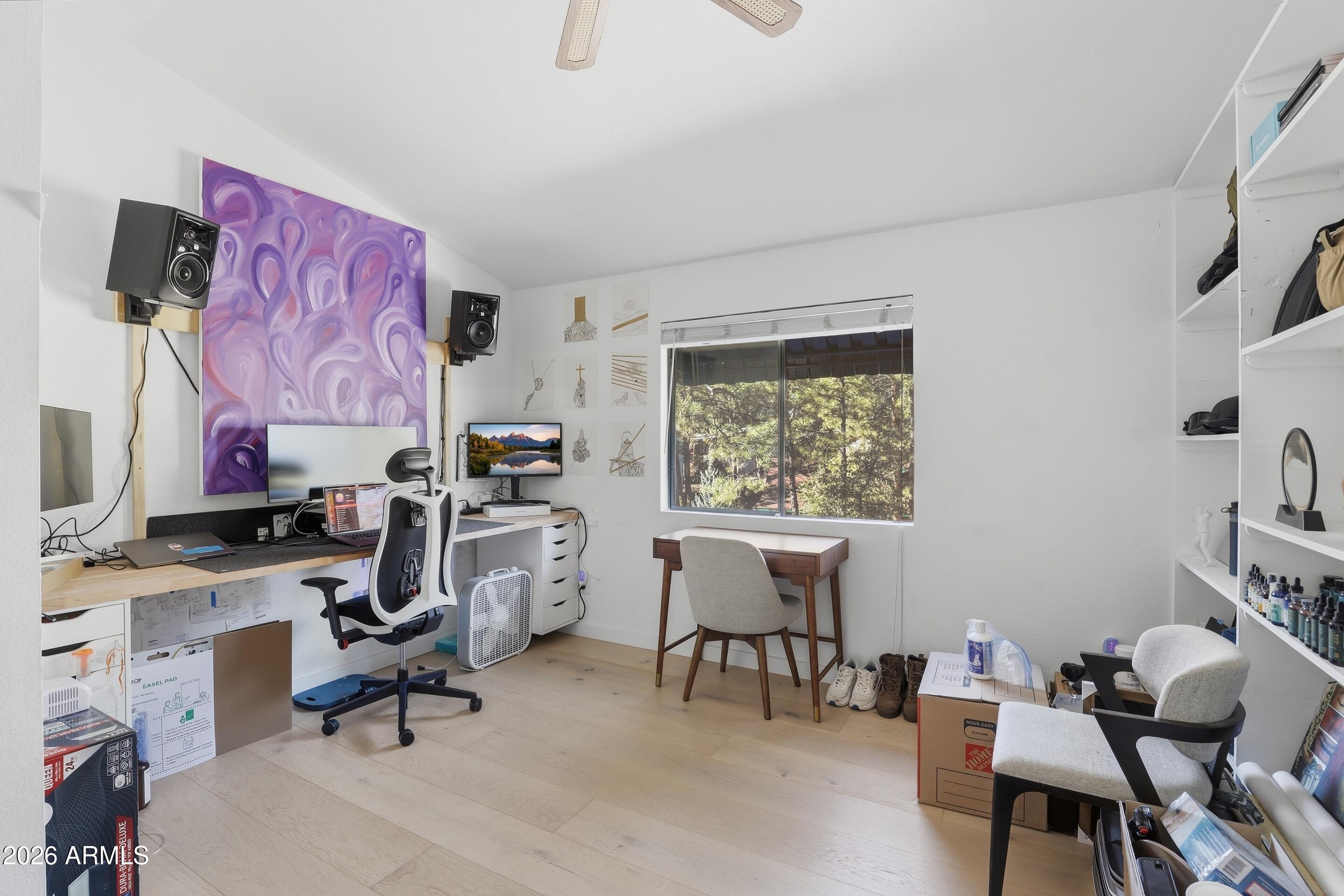 201 North McLane Road Payson, AZ 85541 - Photo 20 of 42 a workspace with furniture and a window