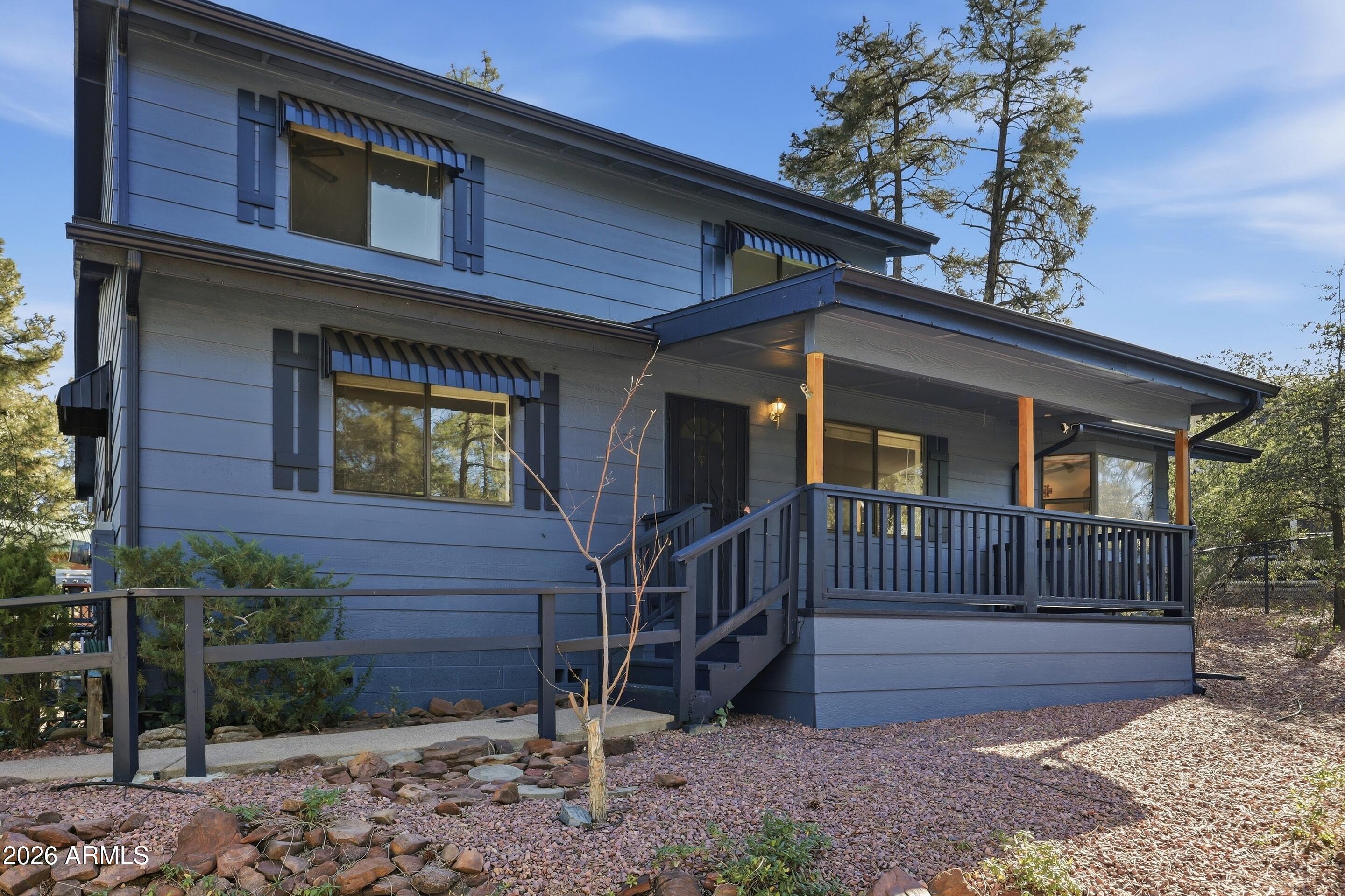 201 North McLane Road Payson, AZ 85541 - Photo 31 of 42 a front view of a house with a porch