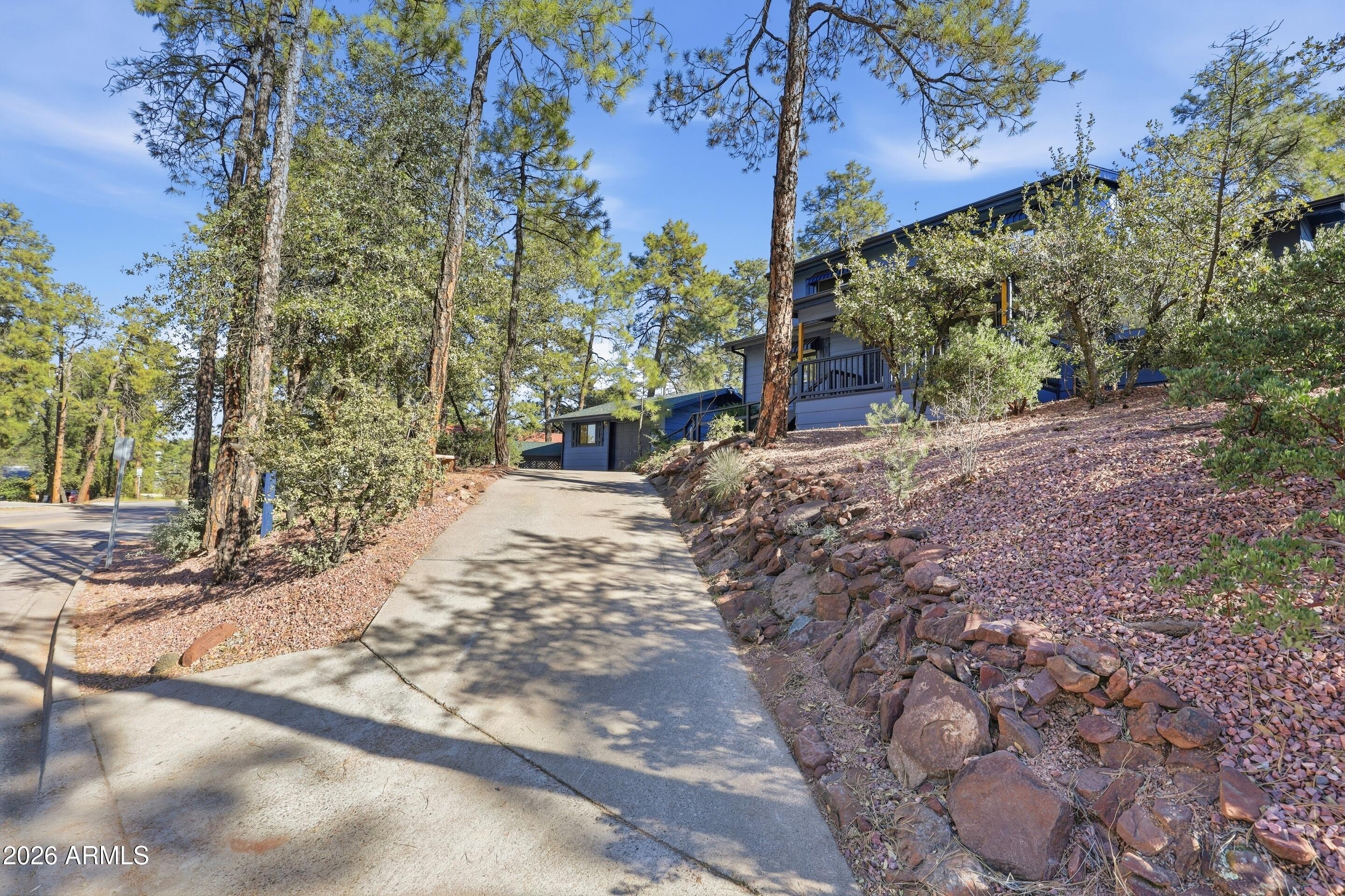 201 North McLane Road Payson, AZ 85541 - Photo 41 of 42 a view of a yard with plants and trees