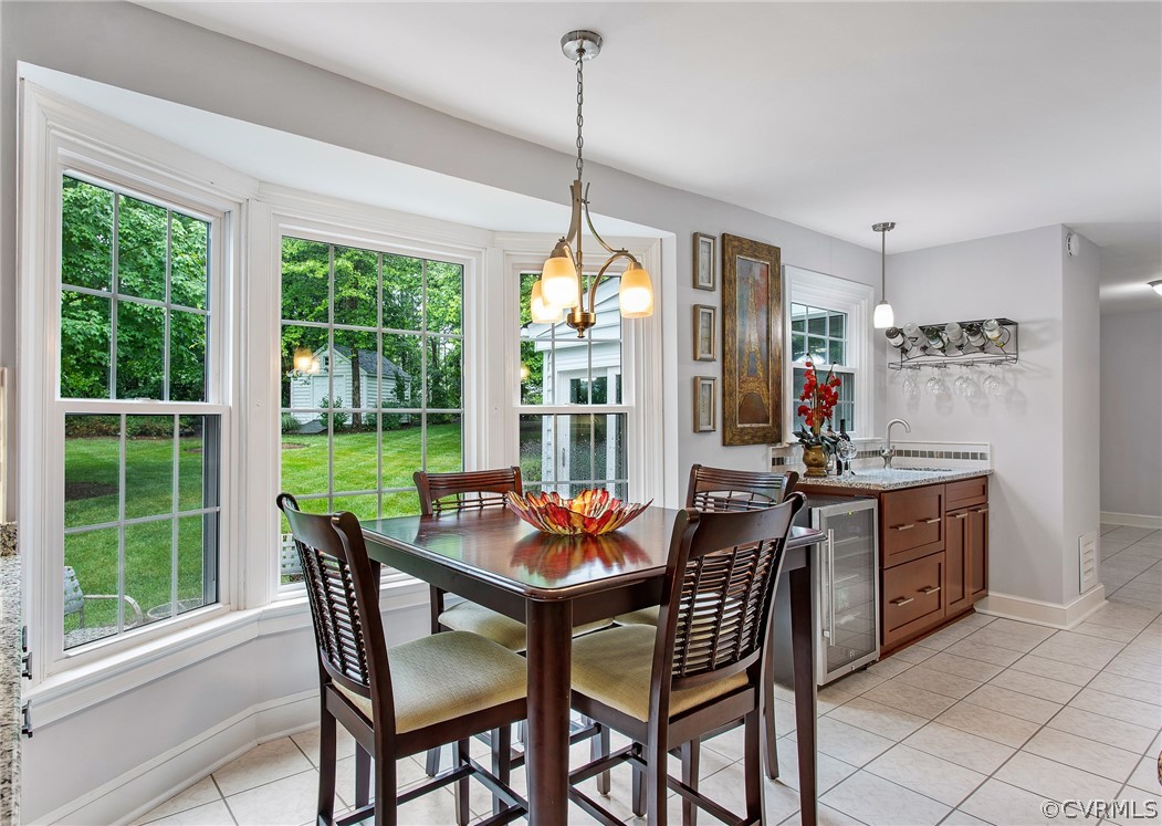 610 Courthouse Road North Chesterfield, VA 23236 - Photo 17 of 50 a dining room with furniture window wooden floor