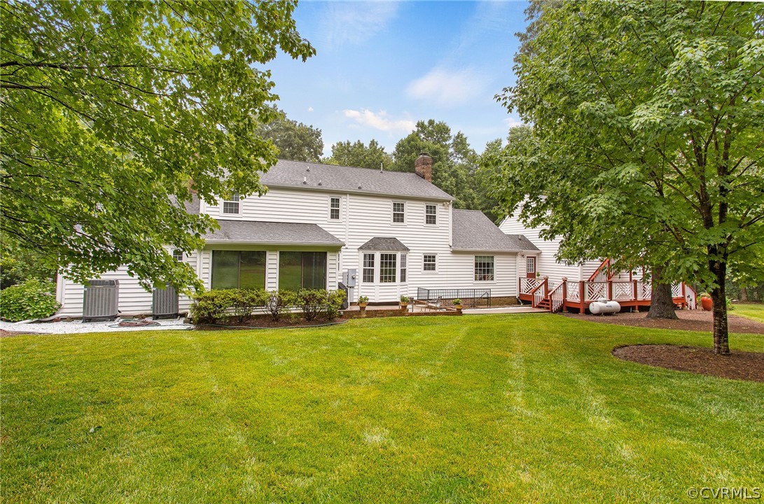 610 Courthouse Road North Chesterfield, VA 23236 - Photo 50 of 50 a front view of a house with a garden and trees