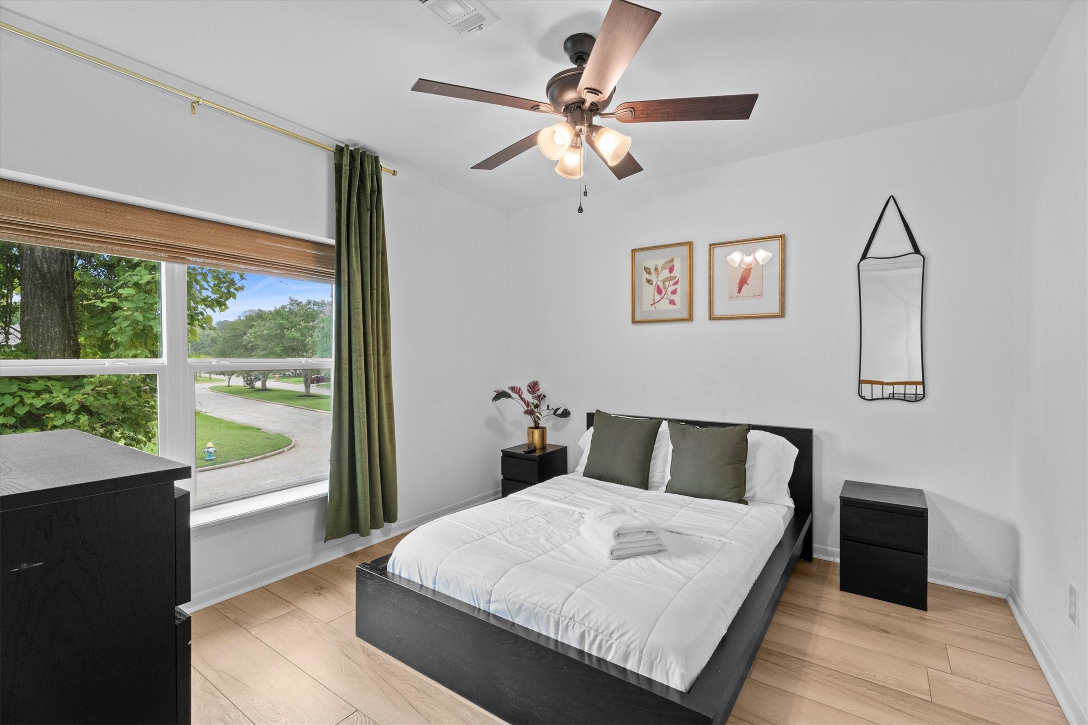 503 Alley Court Spring, TX 77388 - Photo 43 of 48 a bedroom with a large bed and a large window