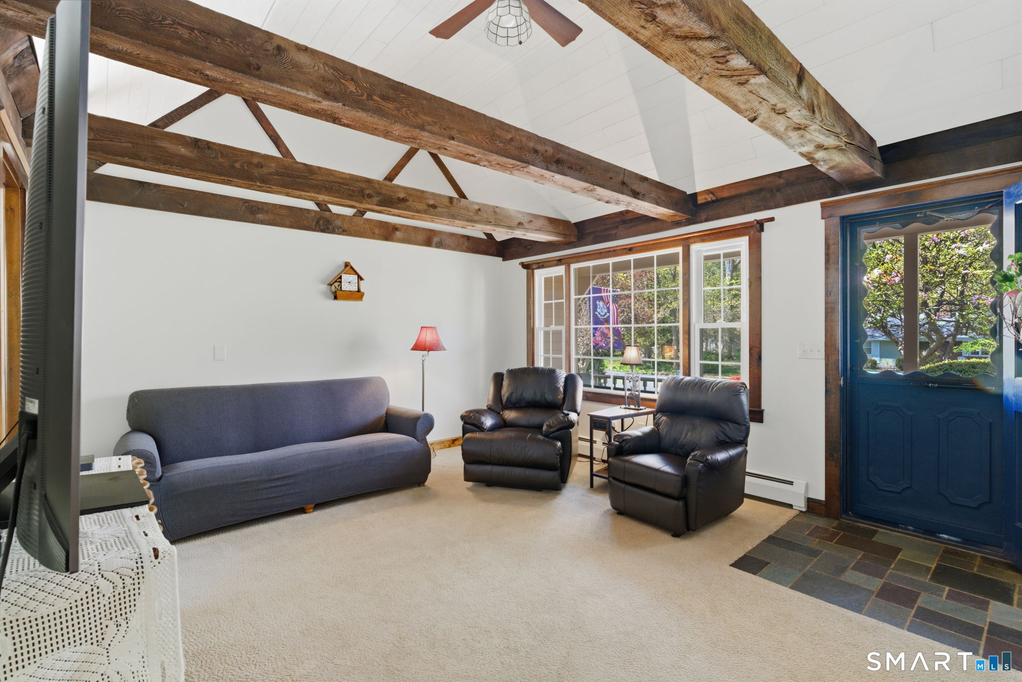 79 Buckboard Lane Bristol, CT 06010 - Photo 24 of 40 a living room with furniture and a floor to ceiling window