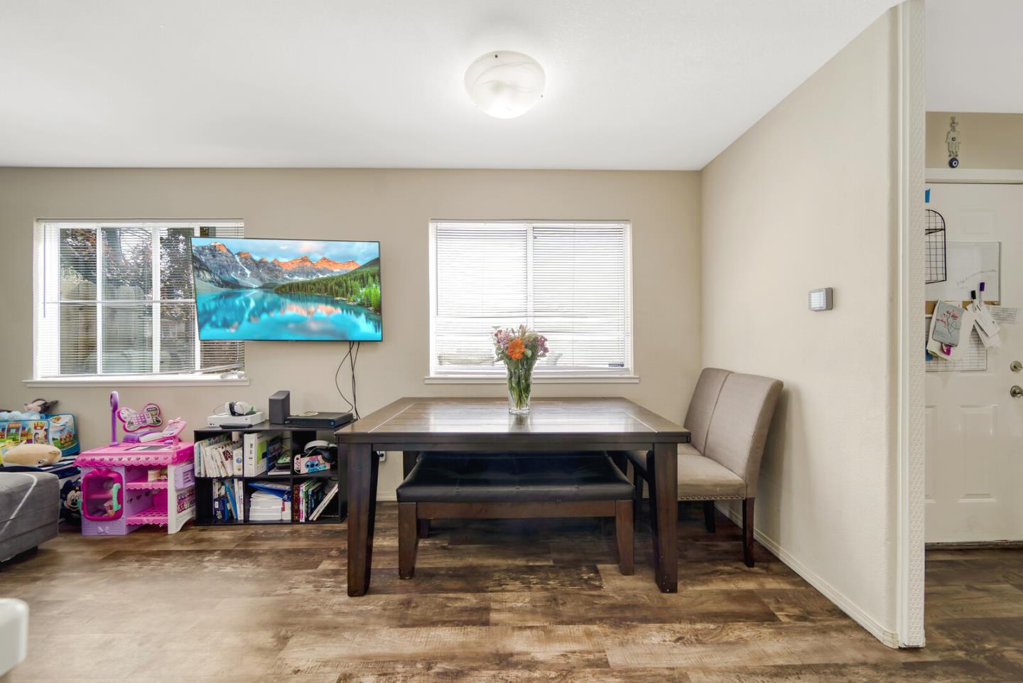 440 Golf Circle Manteca, CA 95337 - Photo 16 of 31 a living room with furniture a rug and a window