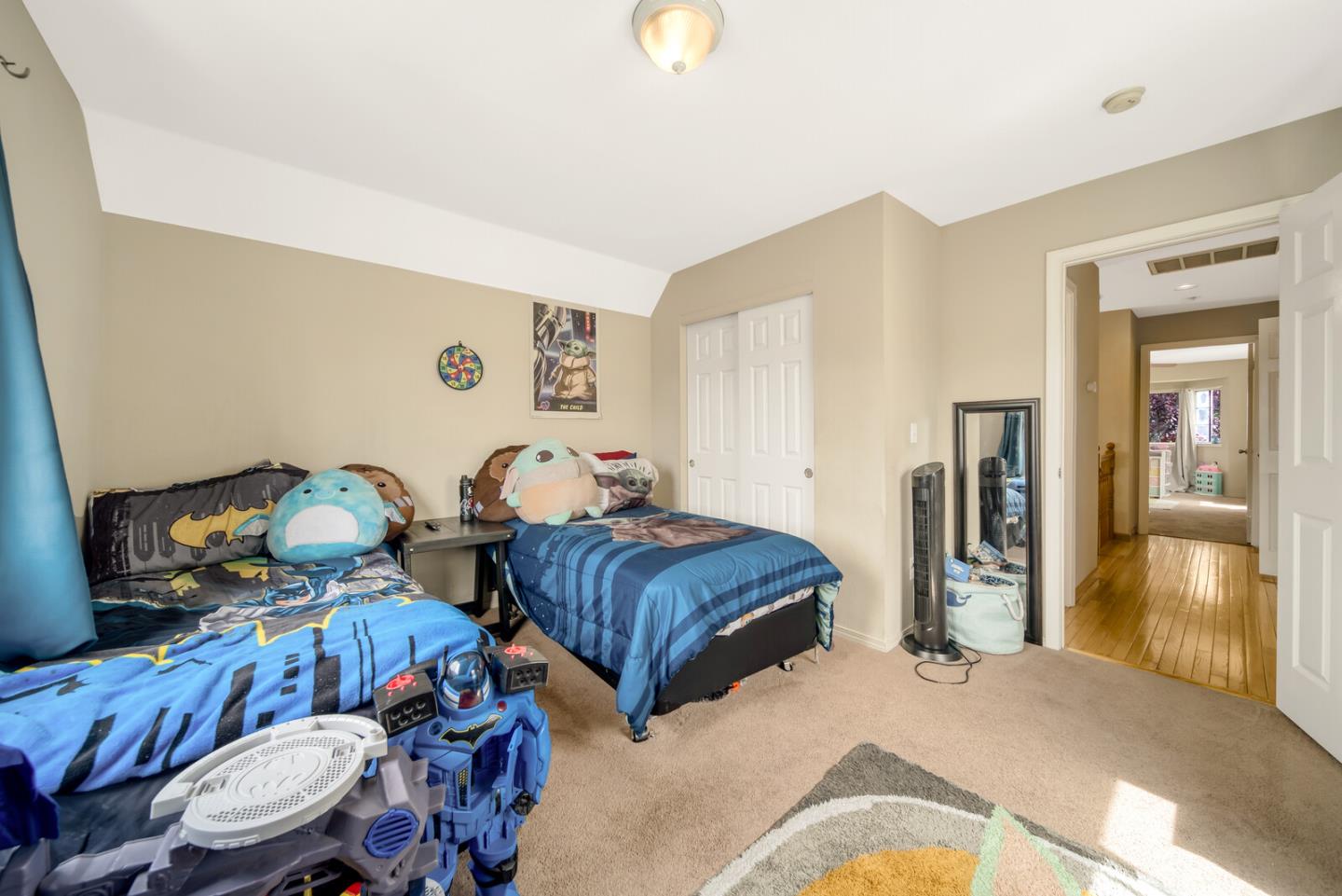 440 Golf Circle Manteca, CA 95337 - Photo 26 of 31 a bedroom with bed and a chandelier
