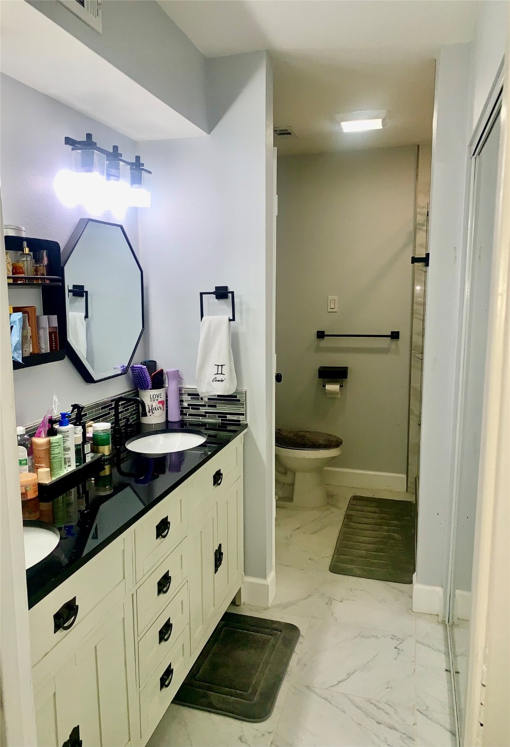 4807 Forest Court Baytown, TX 77521 - Photo 13 of 32 Double vanities in the primary bath