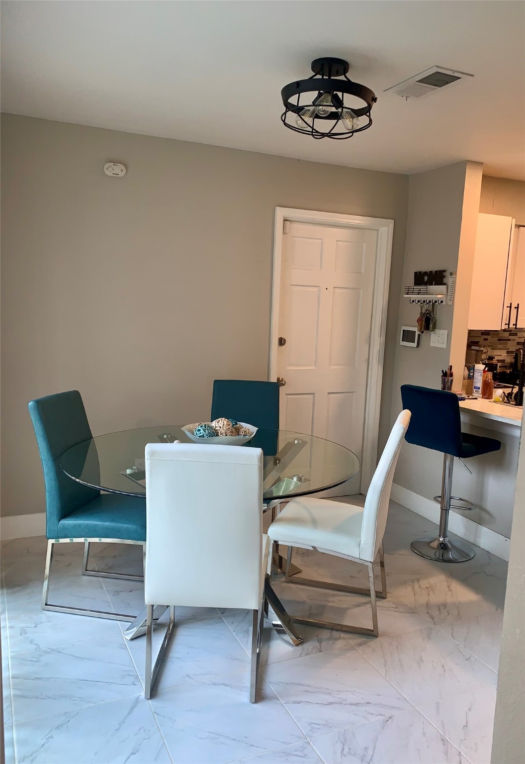 4807 Forest Court Baytown, TX 77521 - Photo 2 of 32 Breakfast area just off the kitchen includes a breakfast bar