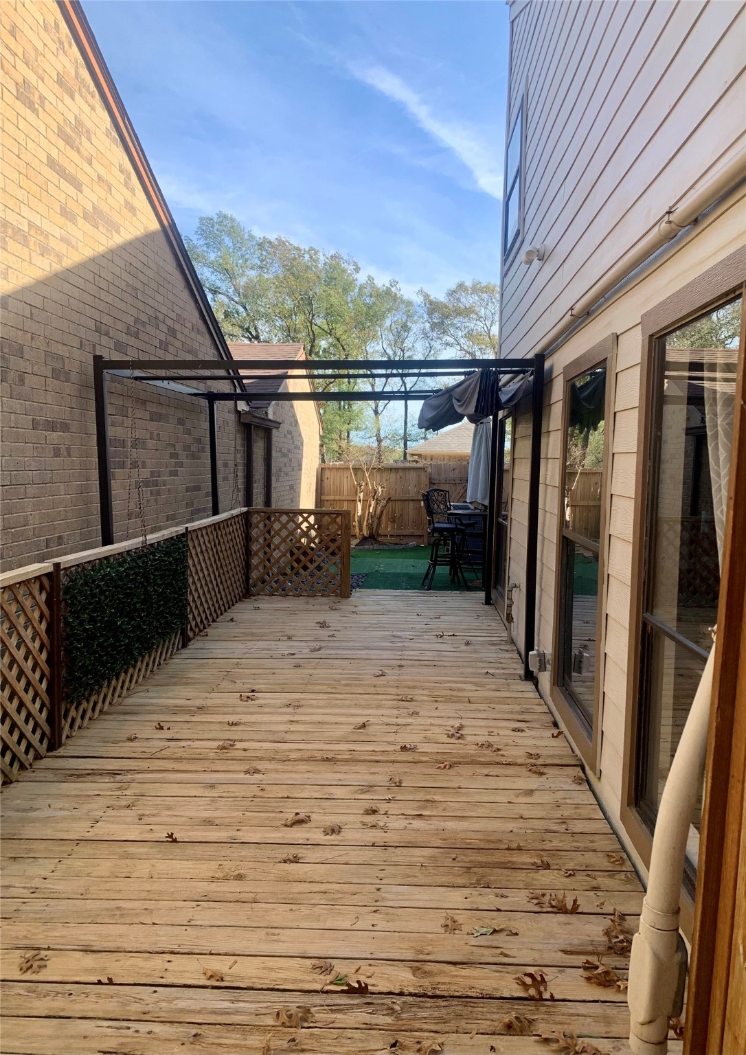 4807 Forest Court Baytown, TX 77521 - Photo 29 of 32 Extended decking with great potential for all of your outdoor living space ideas