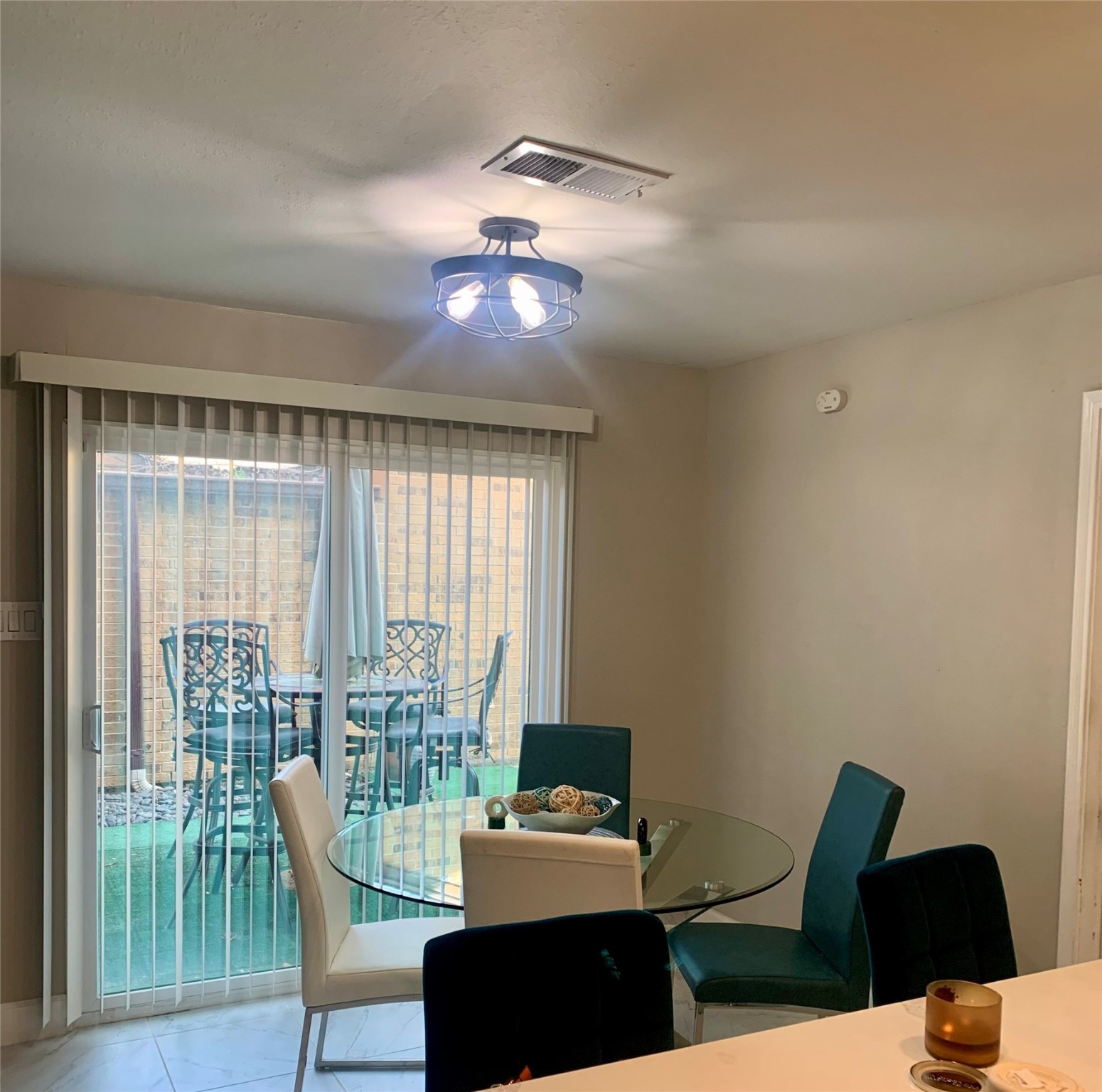 4807 Forest Court Baytown, TX 77521 - Photo 3 of 32 Breakfast area is open to the lovely patio making morning coffee outside a breeze