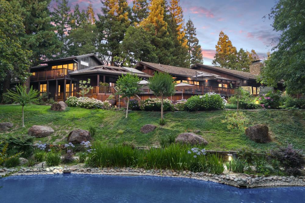 5312 Retreat Way Carmichael, CA 95608 - Photo 2 of 92 a view of a house with backyard sitting area and garden