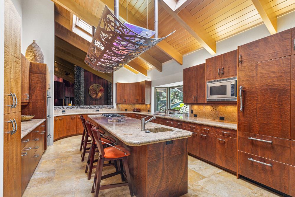 5312 Retreat Way Carmichael, CA 95608 - Photo 28 of 92 a kitchen with a sink and wooden cabinets