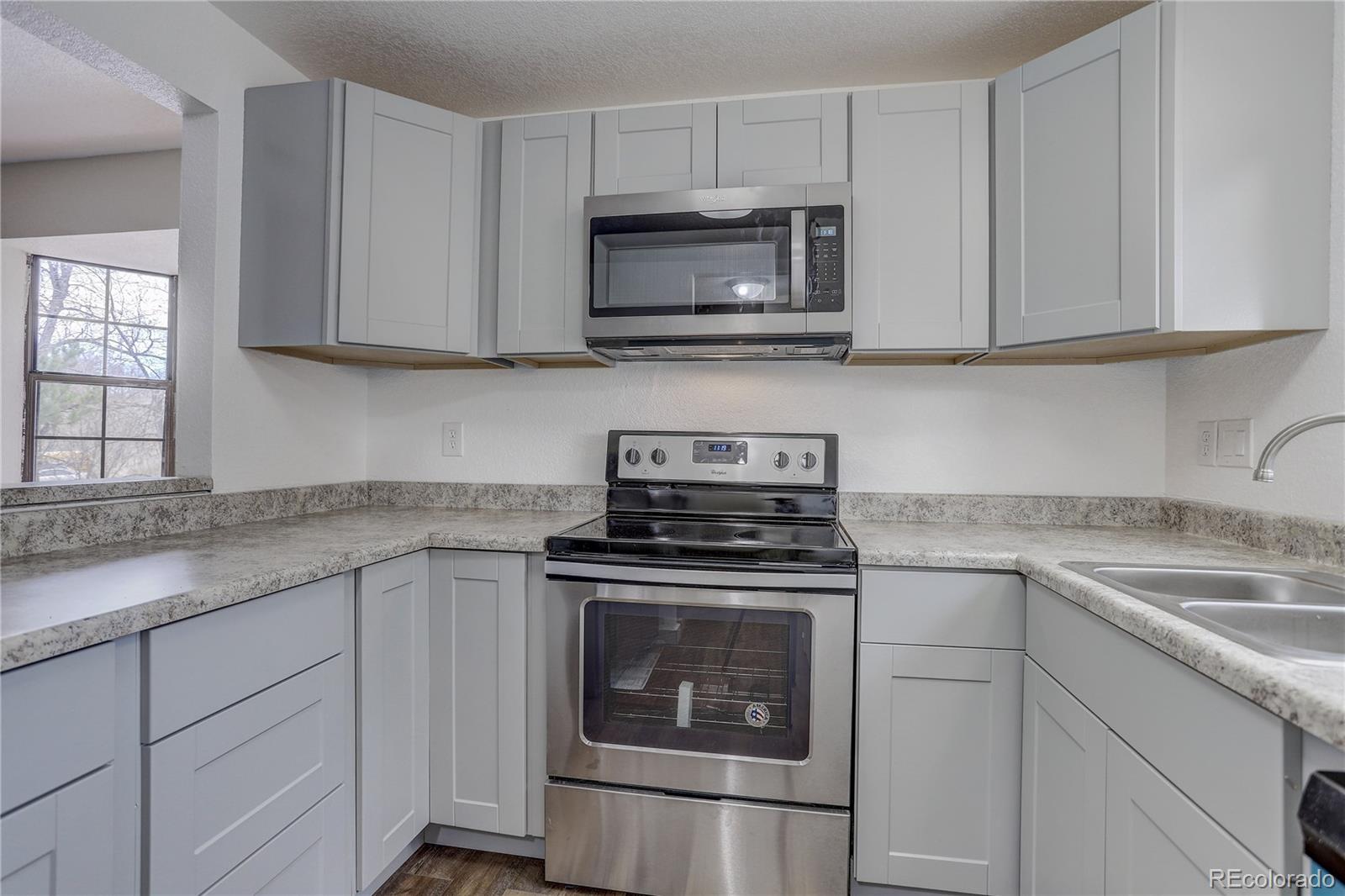 9105 Oberon Road, Unit 1 Arvada, CO 80004 - Photo 3 of 22 Gallery Image 3