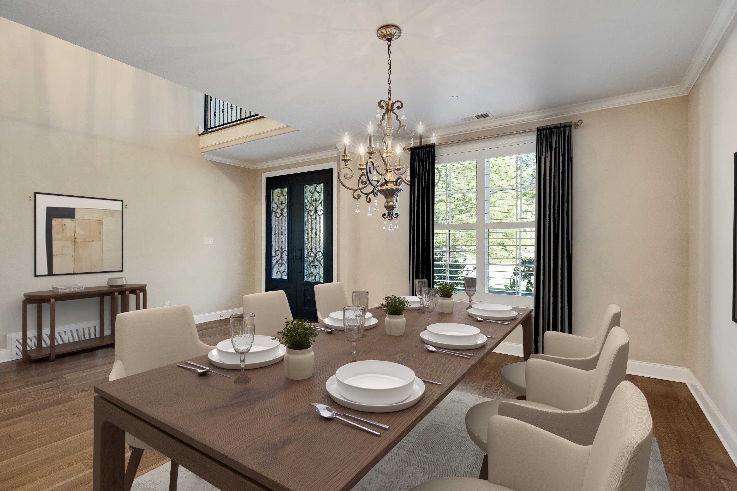 250 Ridgewood Drive Piperton, TN 38017 - Photo 3 of 36 a dining room with furniture a large window and wooden floor