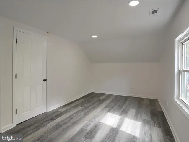 a house that has tree in front of it