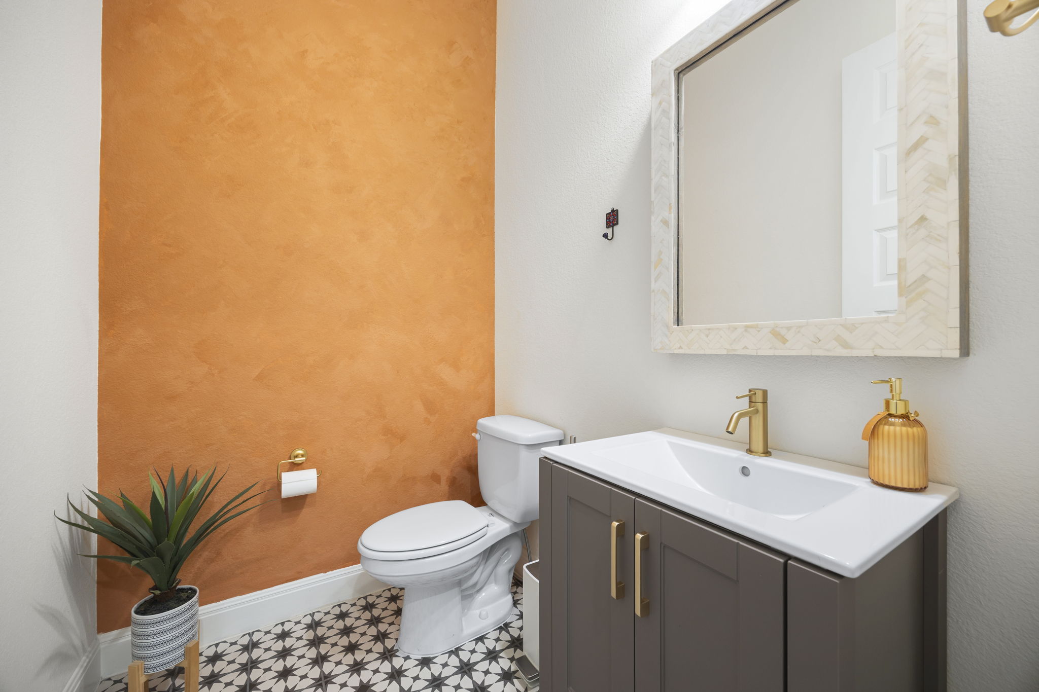1098 Cherrystone Loop Buda, TX 78610 - Photo 20 of 37 a bathroom with a sink and a toilet