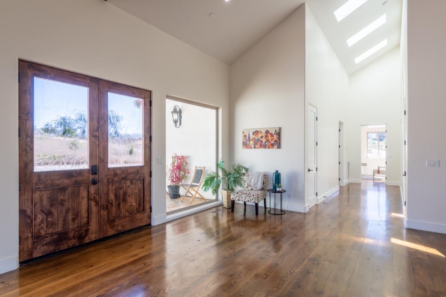 9020 Hidden Canyon Road Salinas, CA 93907 - Photo 28 of 58 a living room with furniture and wooden floor