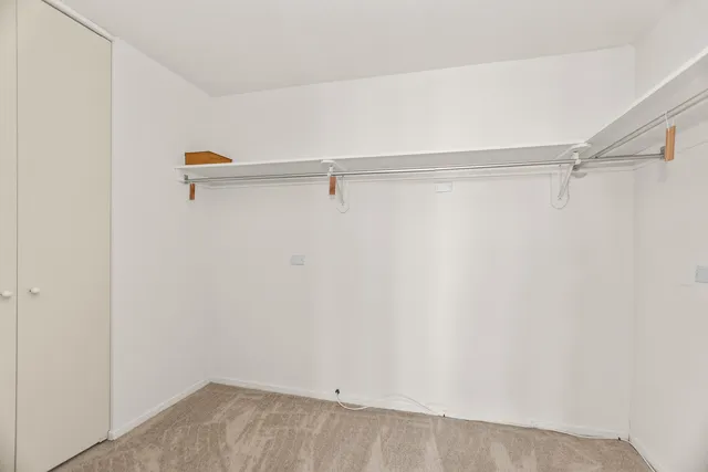 a view of a room with racks on the wall