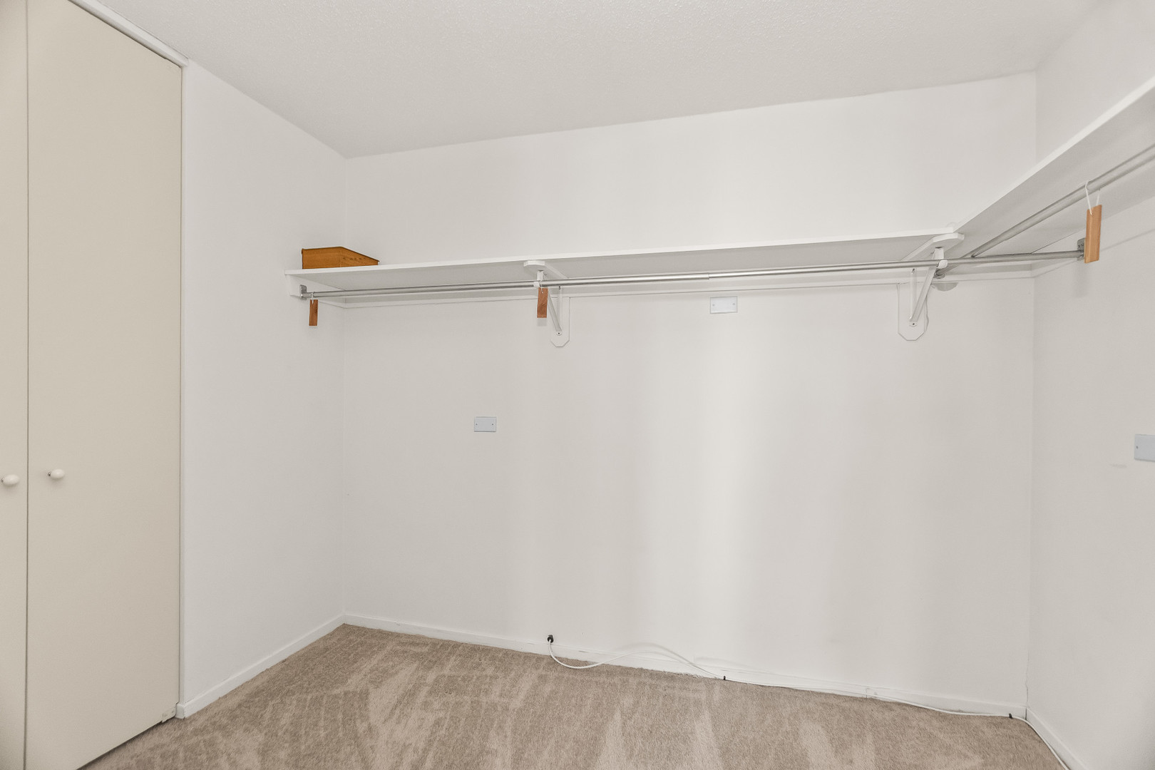 6700 South South Shore Drive, Unit 9D9E Chicago, IL 60649 - Photo 13 of 20 a view of a room with racks on the wall