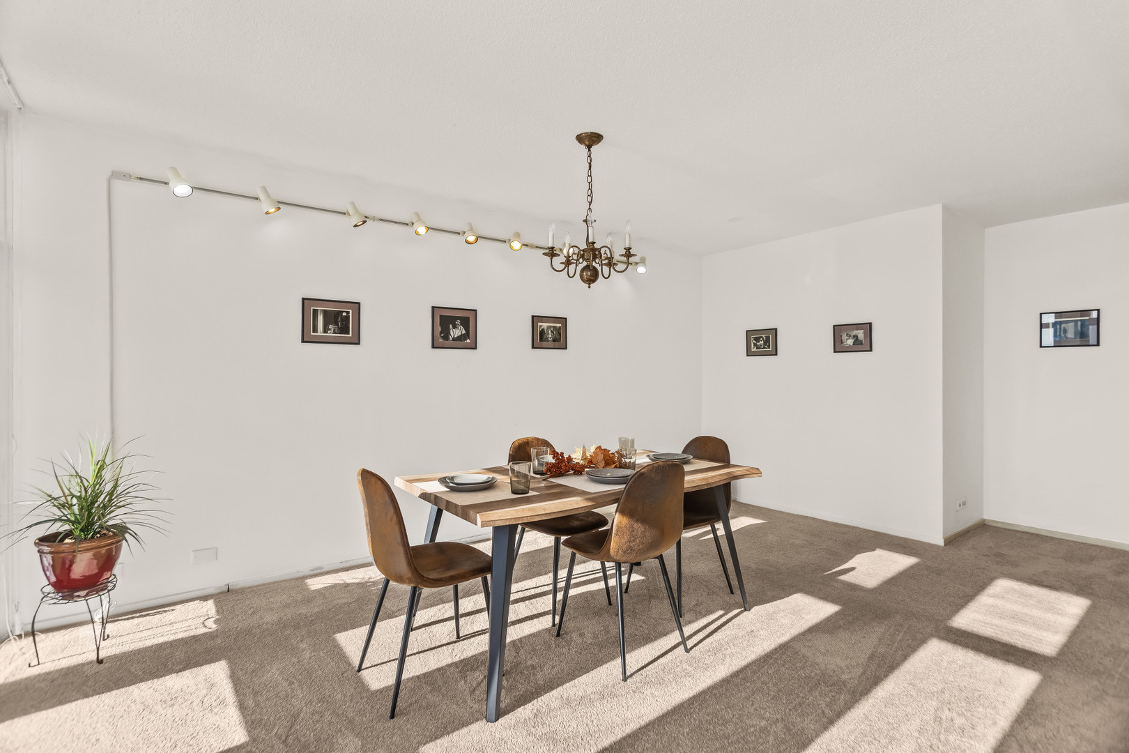6700 South South Shore Drive, Unit 9D9E Chicago, IL 60649 - Photo 5 of 20 a dining room with furniture and chandelier