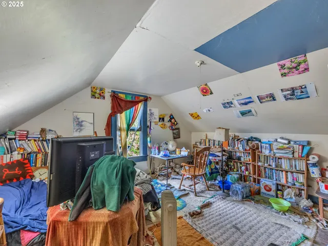 a living room with lots of furniture and a chandelier