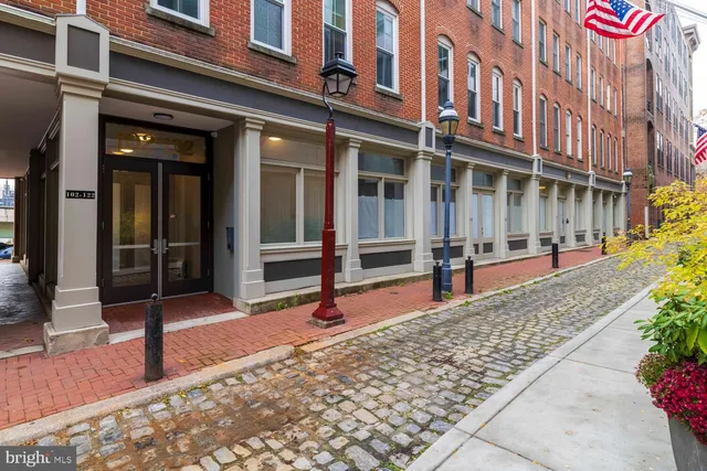 a view of a building with sitting area