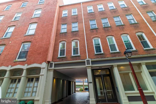 a front view of a multi story building