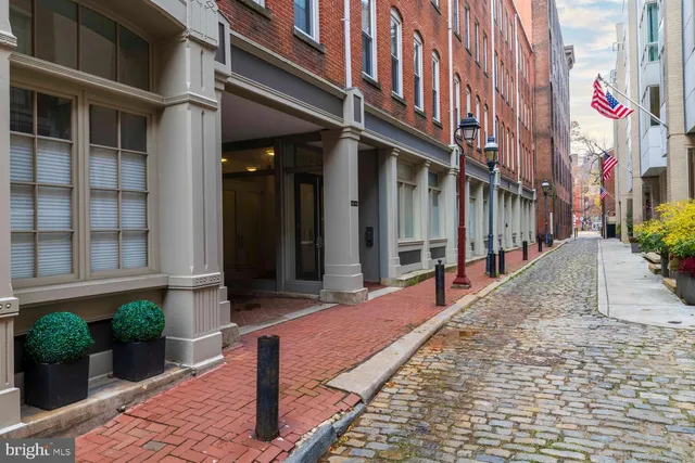 a view of a building on a street