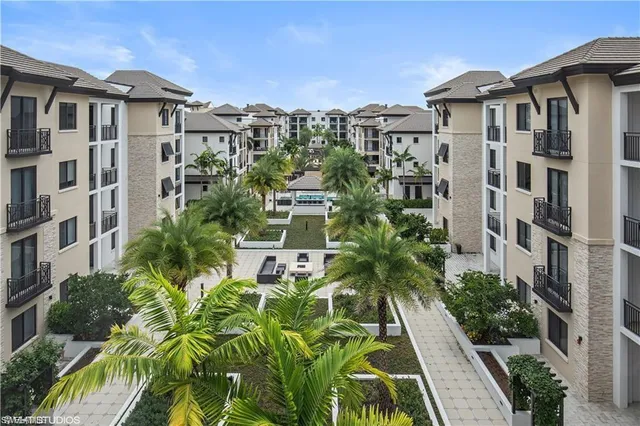 a view of a multi story residential apartment building