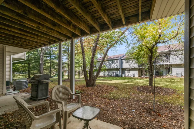 a view of house with backyard