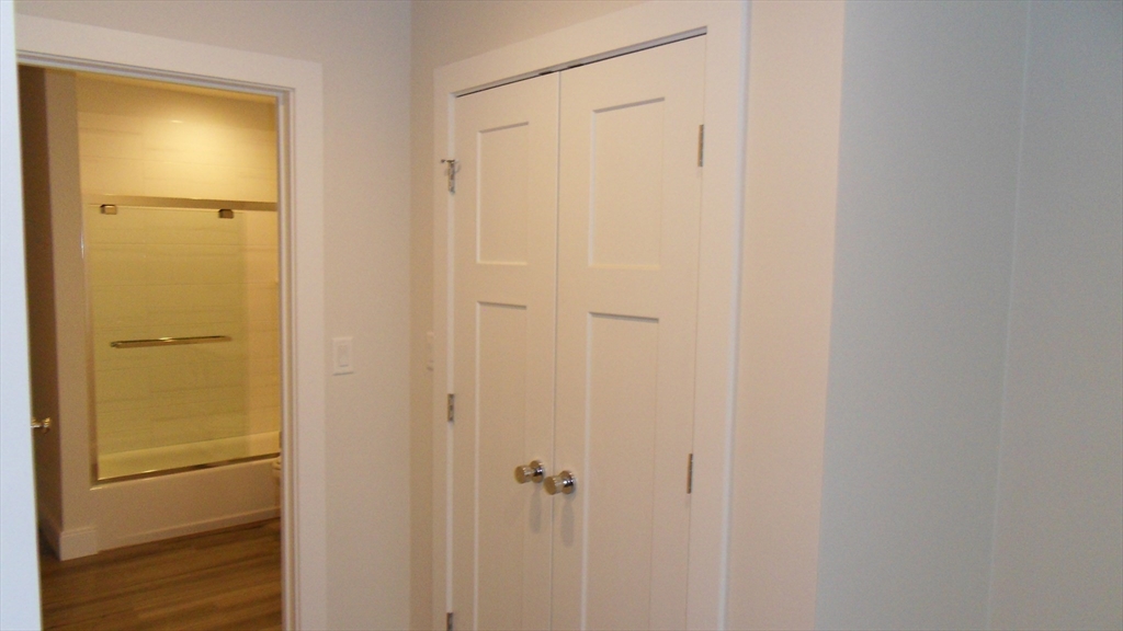 76 Stonley Road, Unit 41 Boston, MA 02130 - Photo 12 of 15 a bathroom with a shower