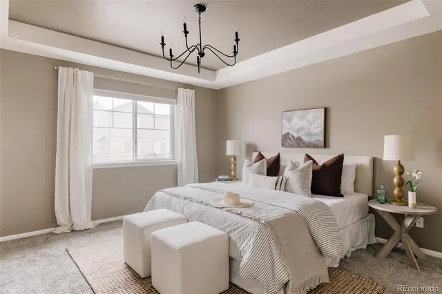 a bedroom with bed and window