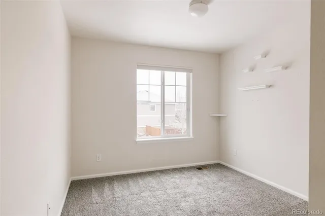 an empty room with a window