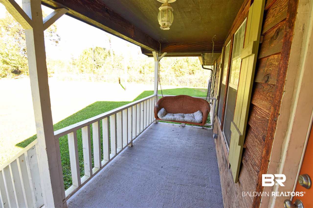 7851 Cuss Fork Road Wilmer, AL 36587 - Photo 16 of 16 front porch swing