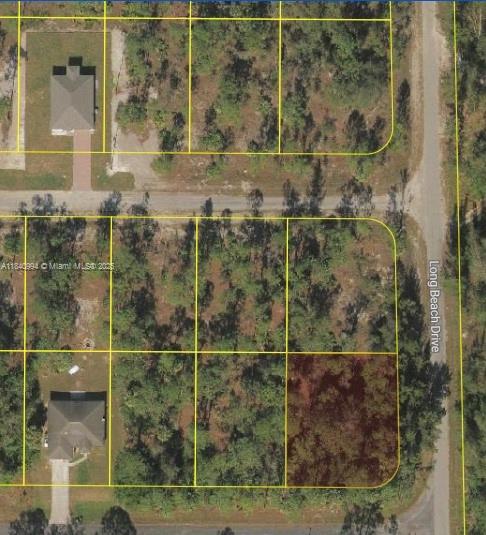 300 Ludlow Avenue Lehigh Acres, FL 33972 - Photo 2 of 7 a bathroom with a shower