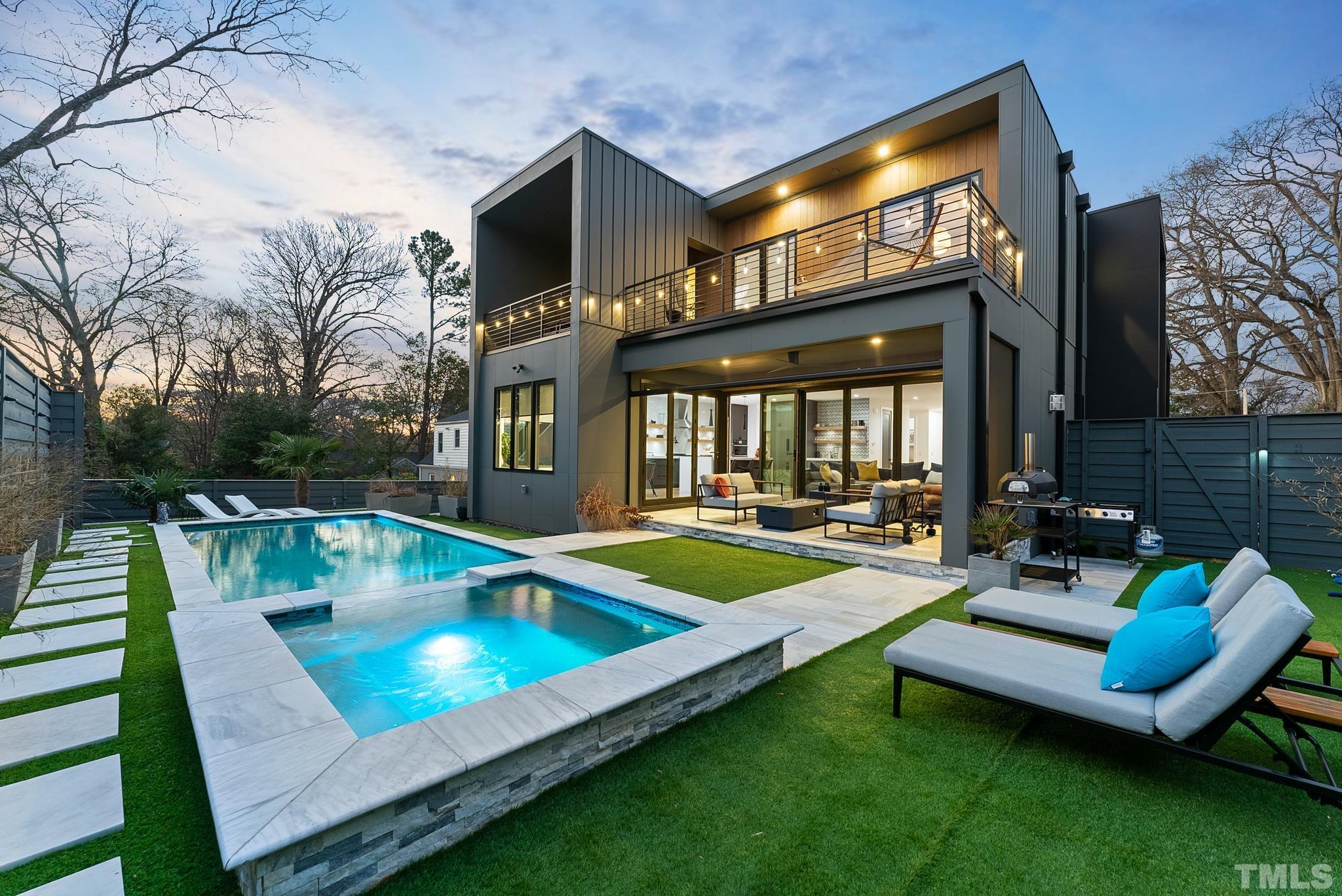 2511 Stafford Avenue Raleigh, NC 27607 - Photo 1 of 74 a view of a house with swimming pool and sitting area